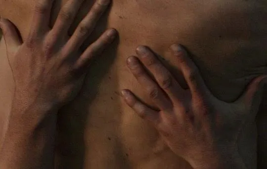 Massage L'Aura — soin signature à deux praticiennes chez L'Aura Tantra Bruxelles